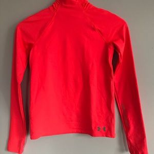 Blend of bright orange, long sleeve, workout top.